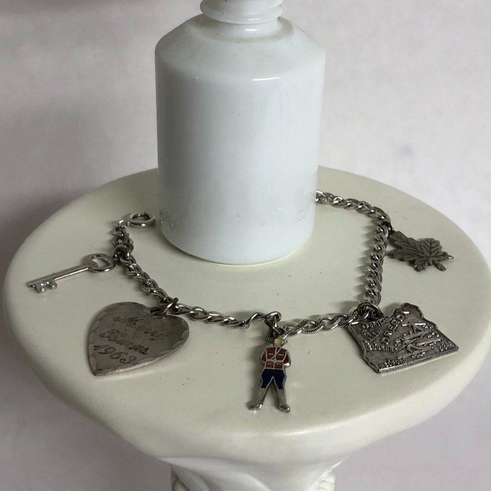 Charm bracelet - sterling silver with charms